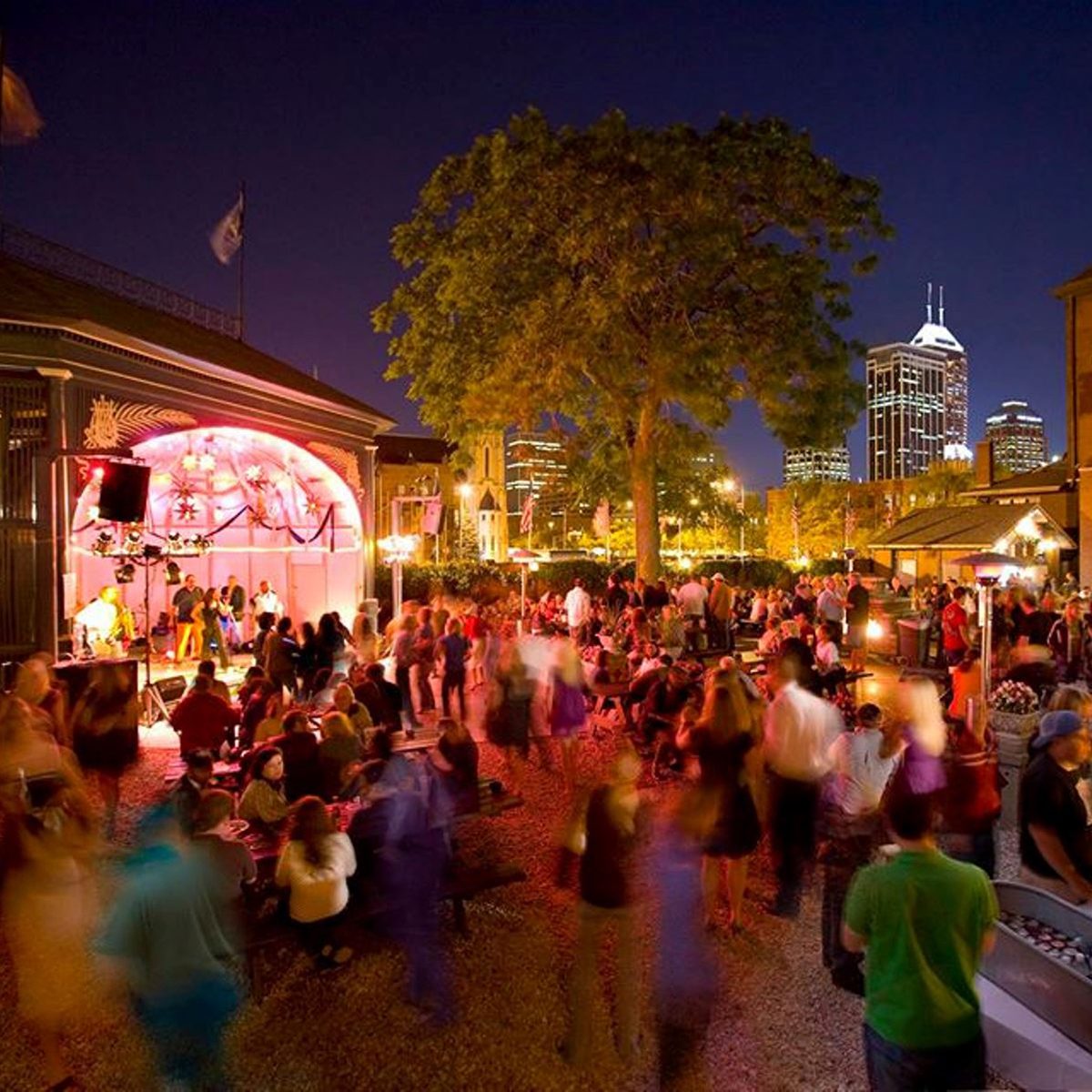 People enjoying a concert and drinks at The Rathskellar