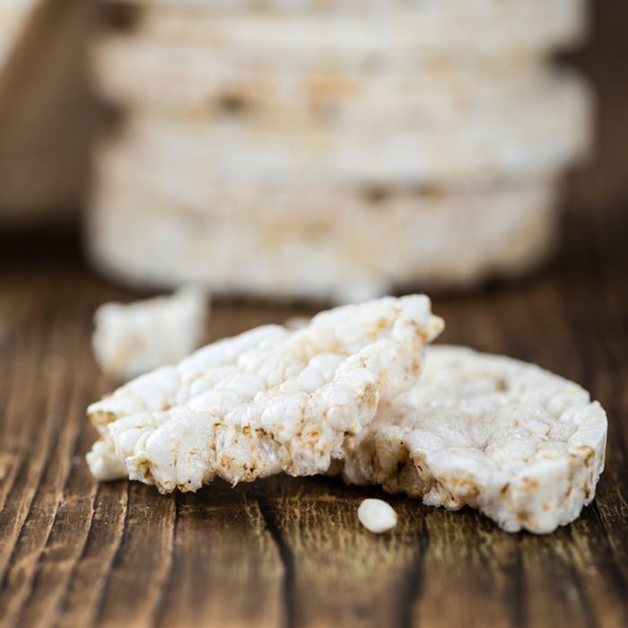 Old wooden table with Rice Cakes (detailed close-up shot)
