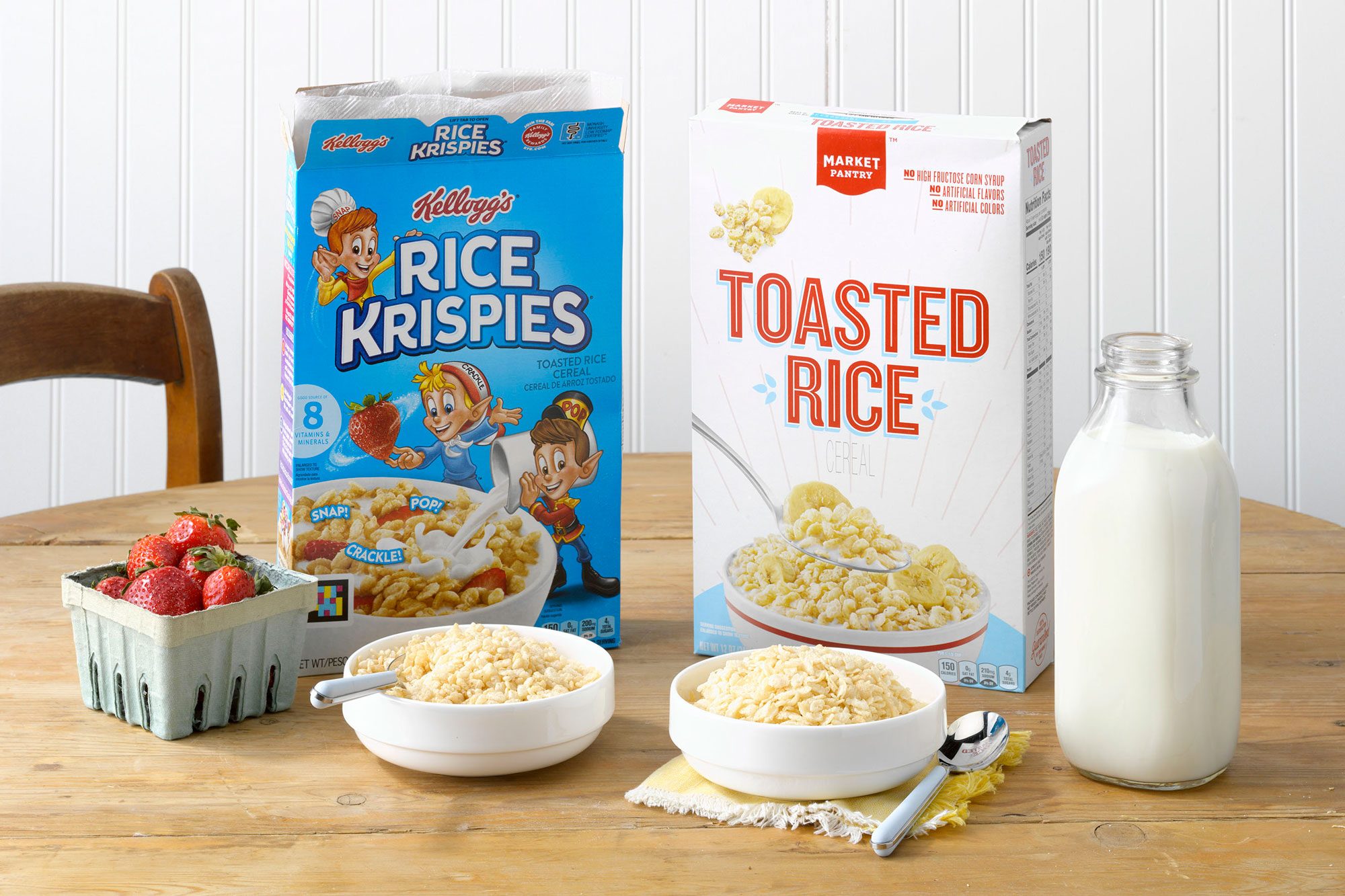 Kellogg's Rice Krispies and Target's Market Pantry Toasted Rice on a table with strawberries and milk