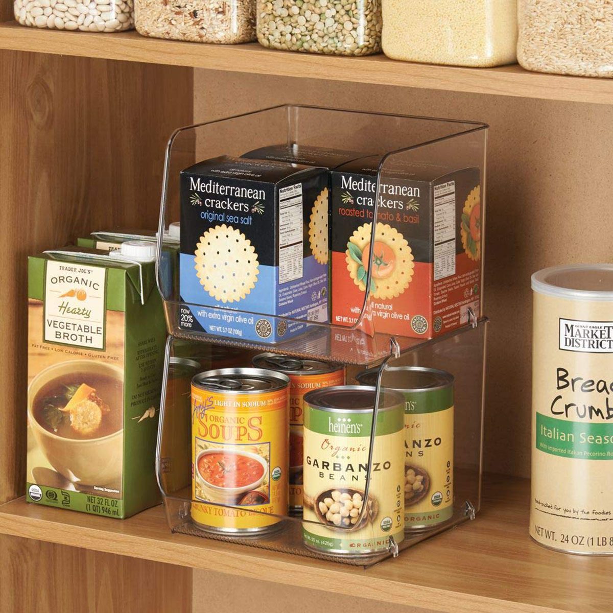 Food Bins filled with canned soup on the bottom and boxes of tea on top