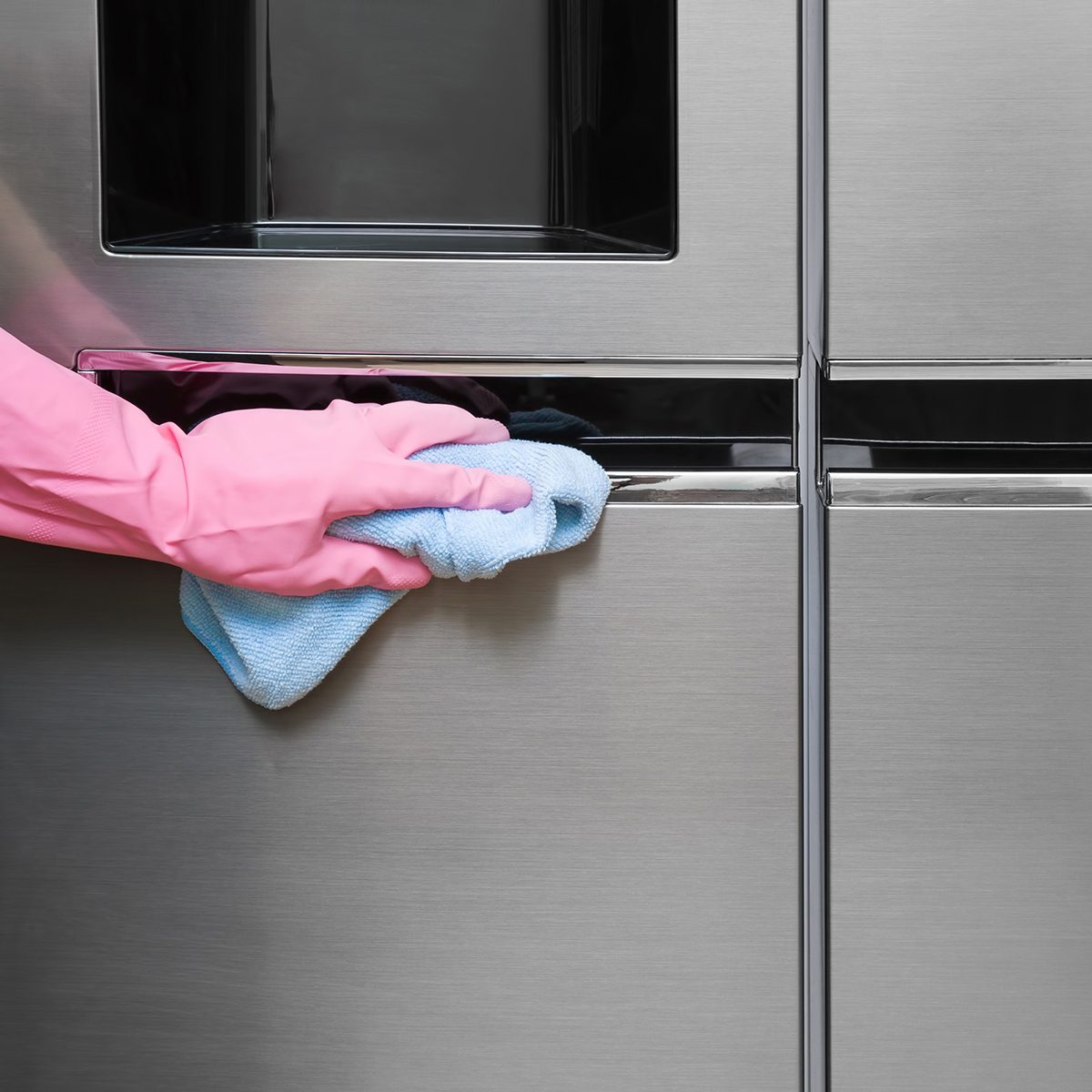 Wiping down fridge exterior