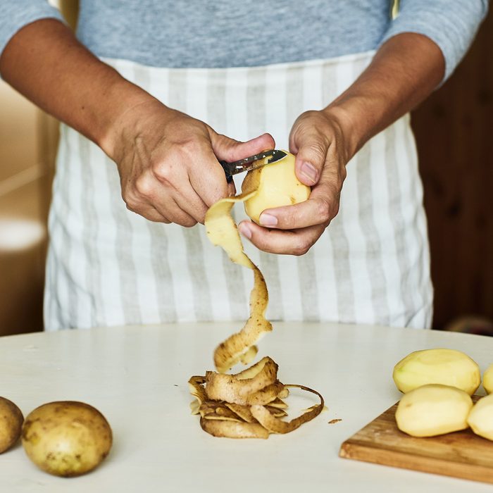 Peeling potatoes