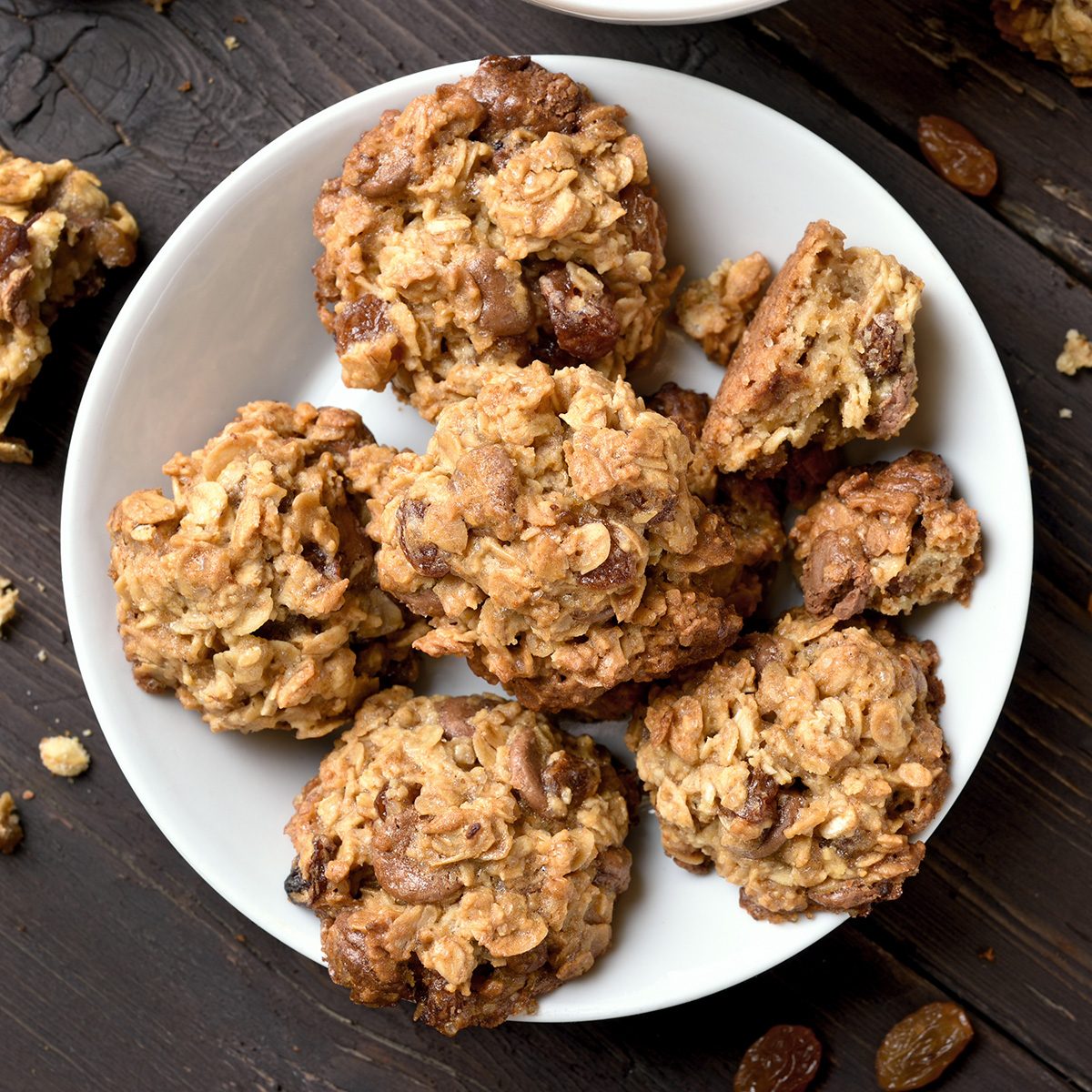 Healthy oatmeal cookies on plate over wooden background, top view; Shutterstock ID 740216929; Job (TFH, TOH, RD, BNB, CWM, CM): TOH