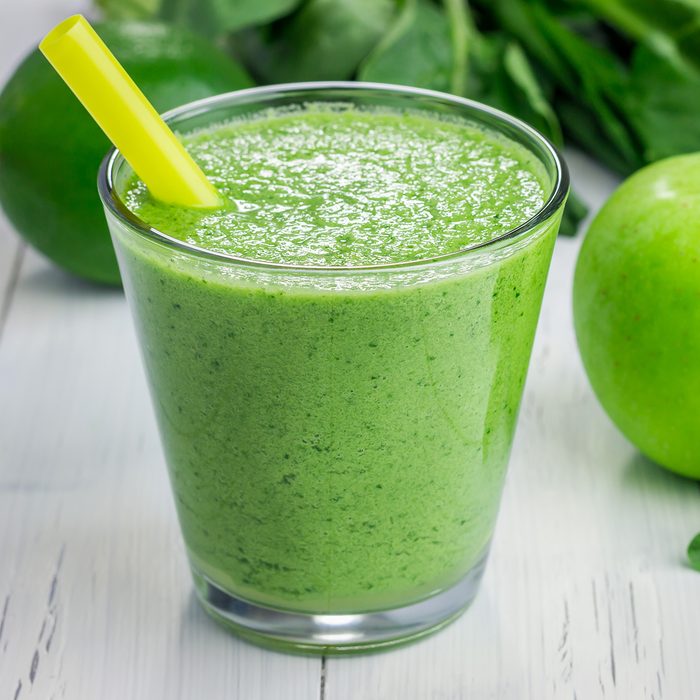 Healthy smoothie with green apple, spinach, lime and coconut milk