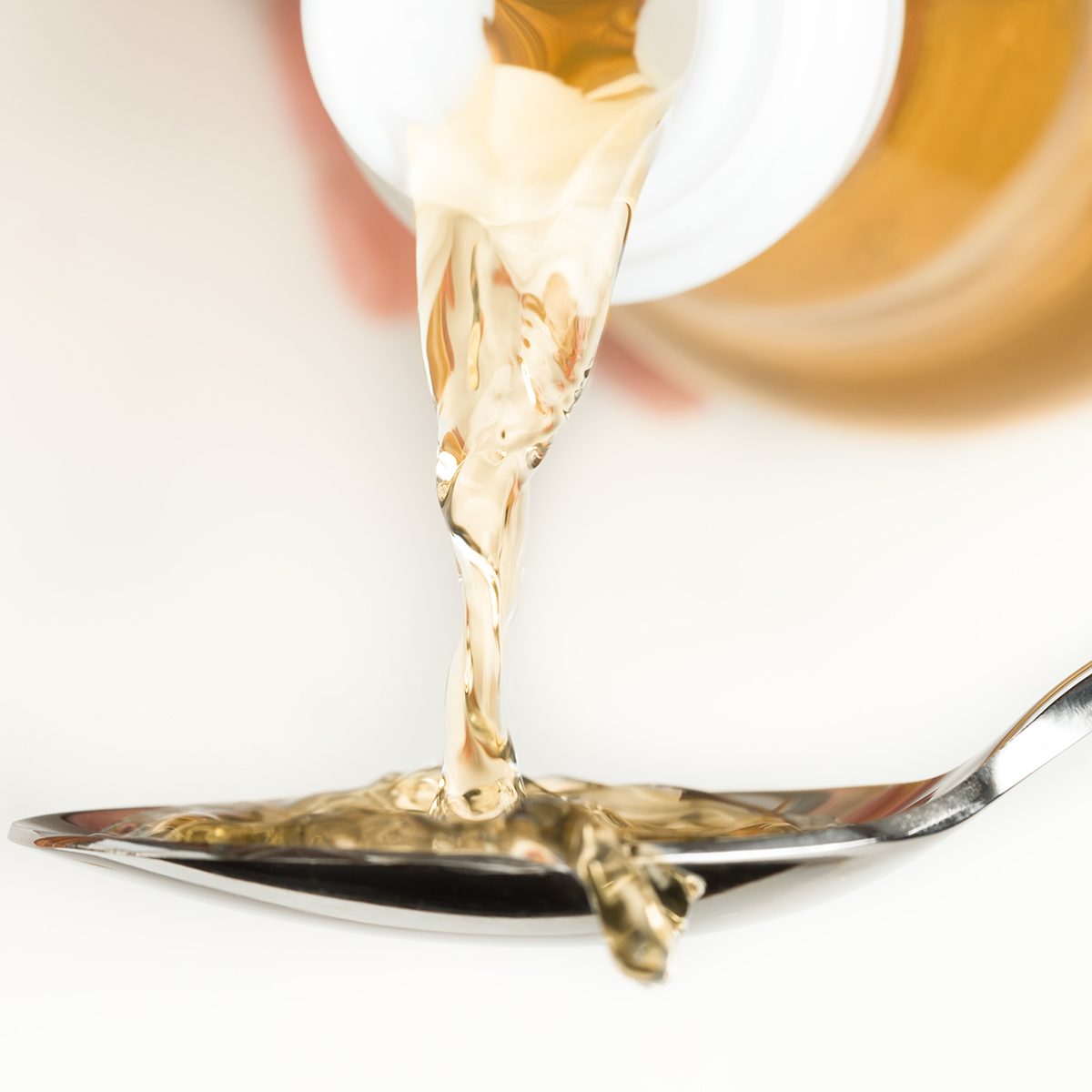 Pouring Rice Vinegar on a Spoon
