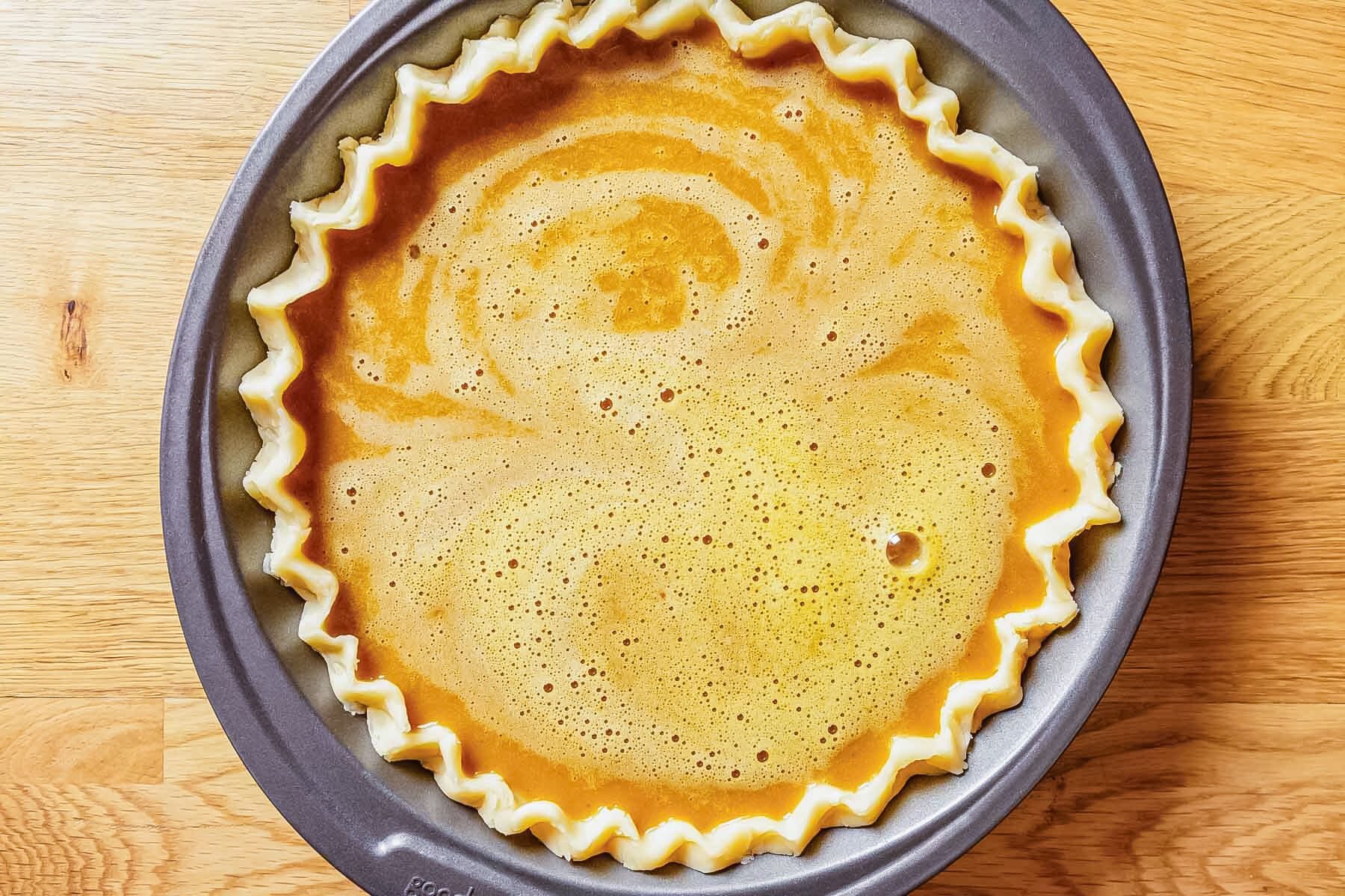 Dairy Free Pumpkin Pie Dough and Filling Ready to Bake in Baking Plate