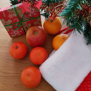 Christmas Stocking filled with fruit and gifts, Christmas decoration