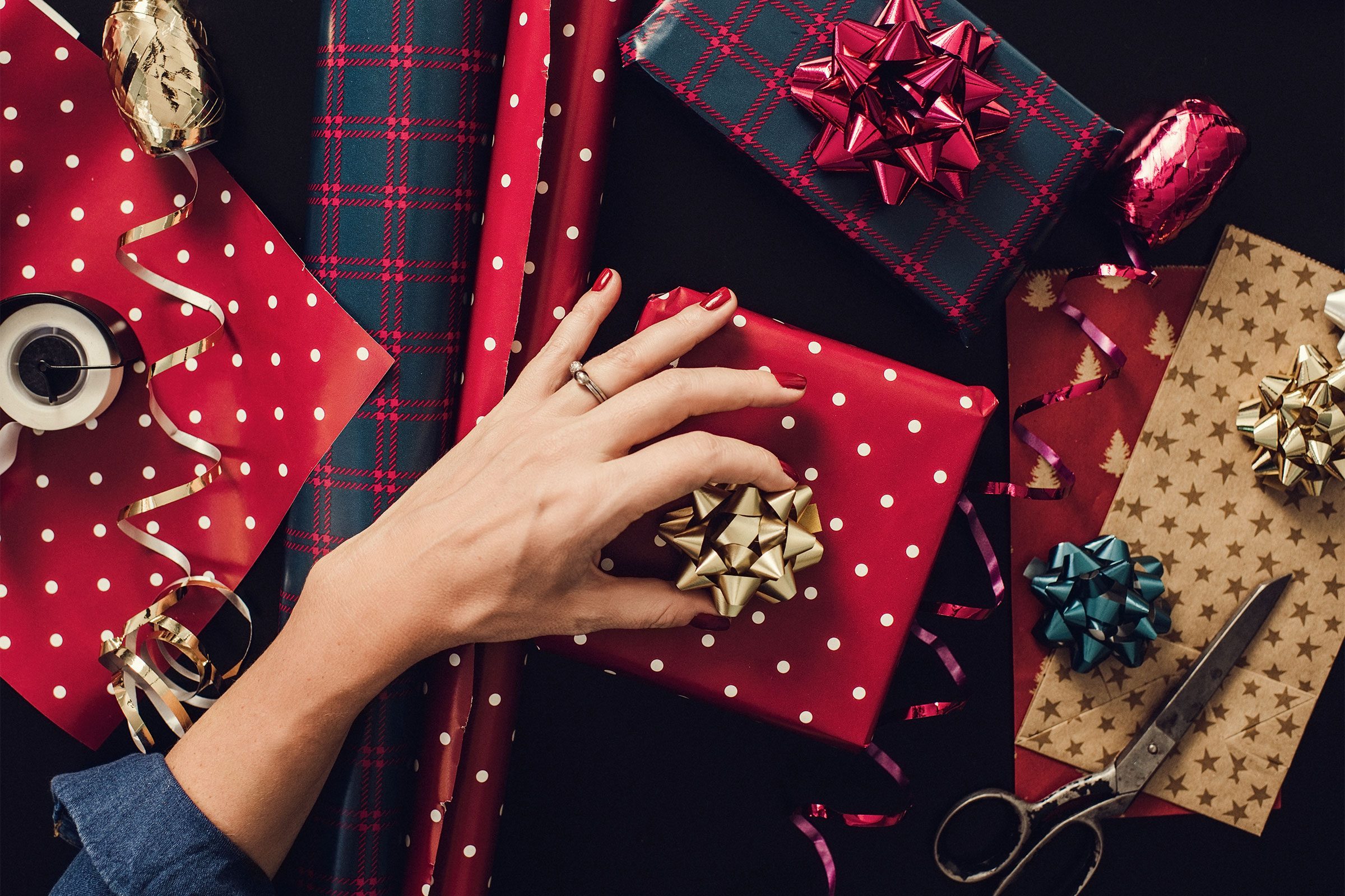 Here’s How to Wrap Christmas Presents Like Santa’s Helper