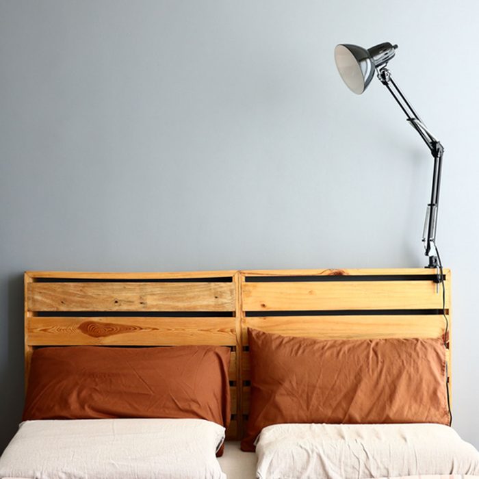 Loft bedroom with lamp turned off.