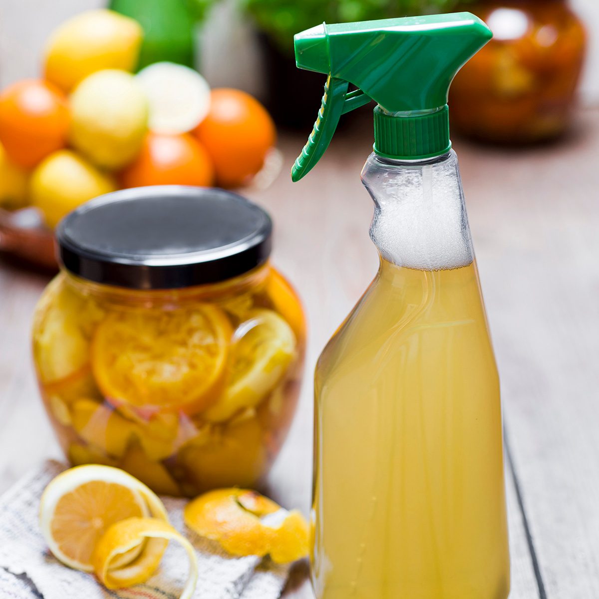 Homemade cleansing agent, vinegar, peels of citrus fruits, ginger and water