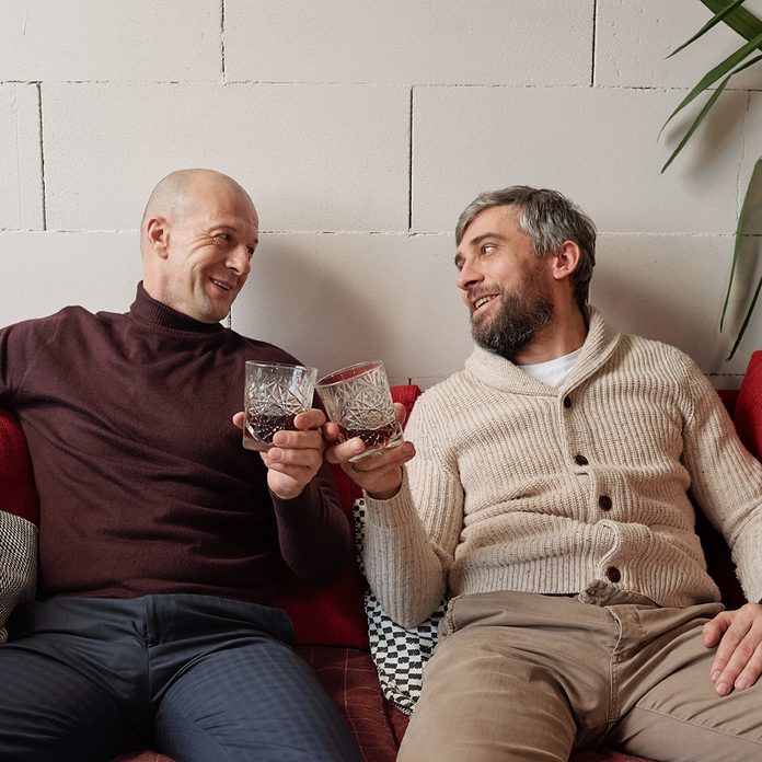 Drinking Whisky With Friend At Home