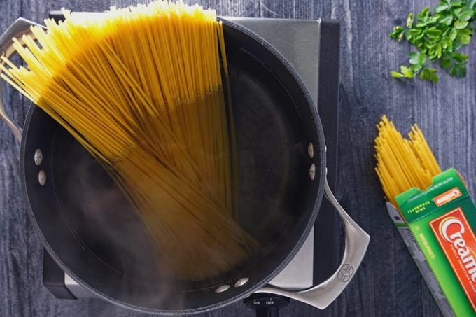 Cooking The Pasta For Chicken Bellagio