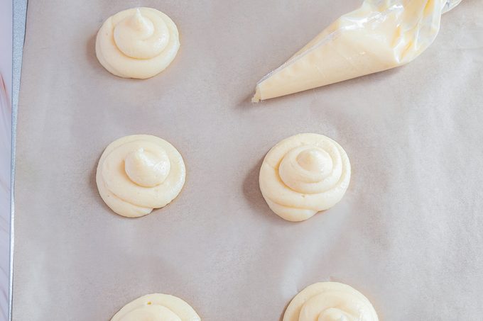 Choux Au Craquelin piping on baking pan