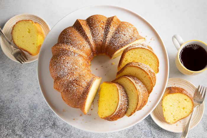 Pound cake in Bundt pan with coffee