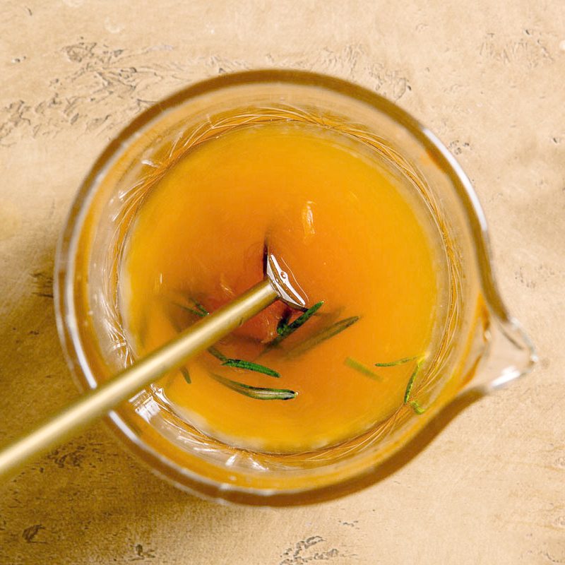 top view of a cocktail being mixed in a glass