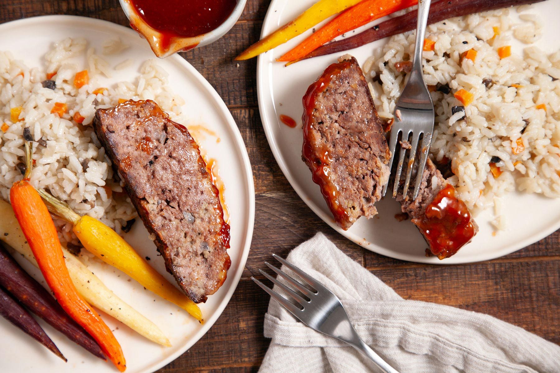 Cooked Meat Loaf served with rice and sauce