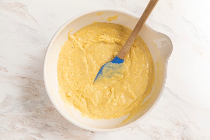 Stir ingredients for gluten free corn bread