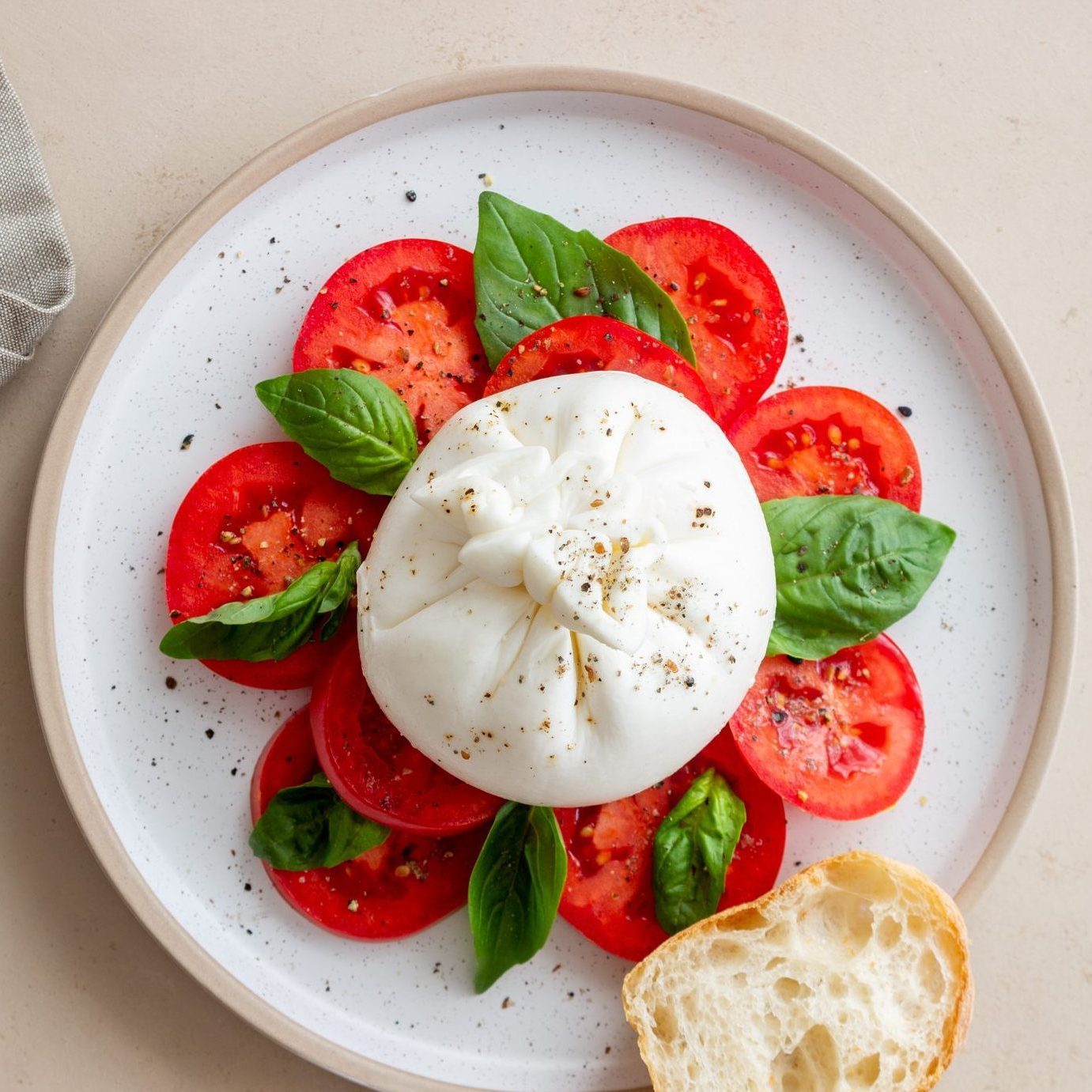 Italian burrata cheese with tomatoes and basil. Salad. Healthy eating. Vegetarian food.