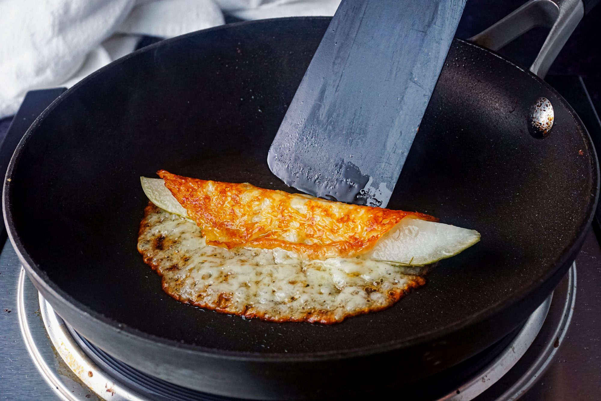 Pickle and Cheese Slice frying in pan