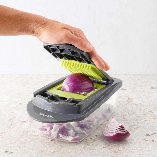 using the Mueller Vegetable Chopper to chop an onion