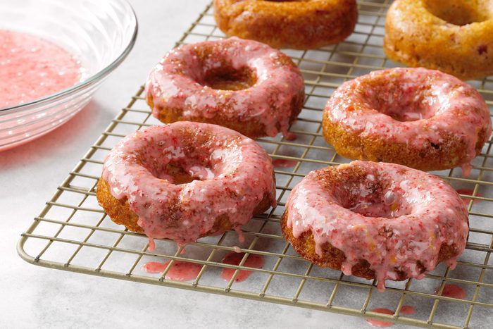 Strawberry Glazed Doughnuts on Wire Rack