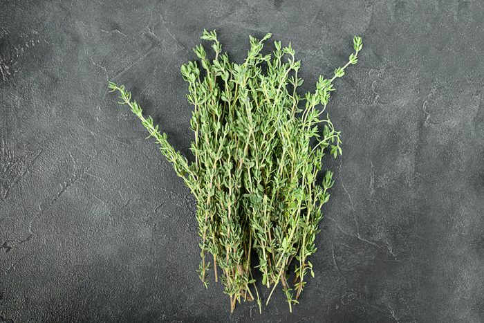 bunch of thyme on stone background