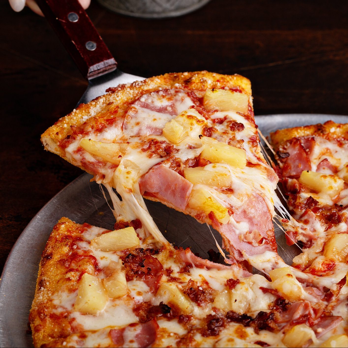 Hawaiian pizza with ham and pineapple