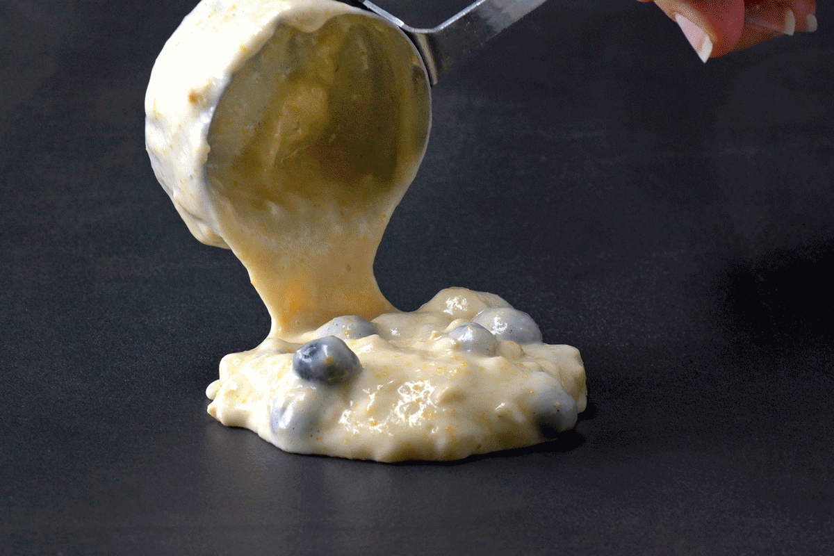 Cooking Blueberry Pancake on skillet