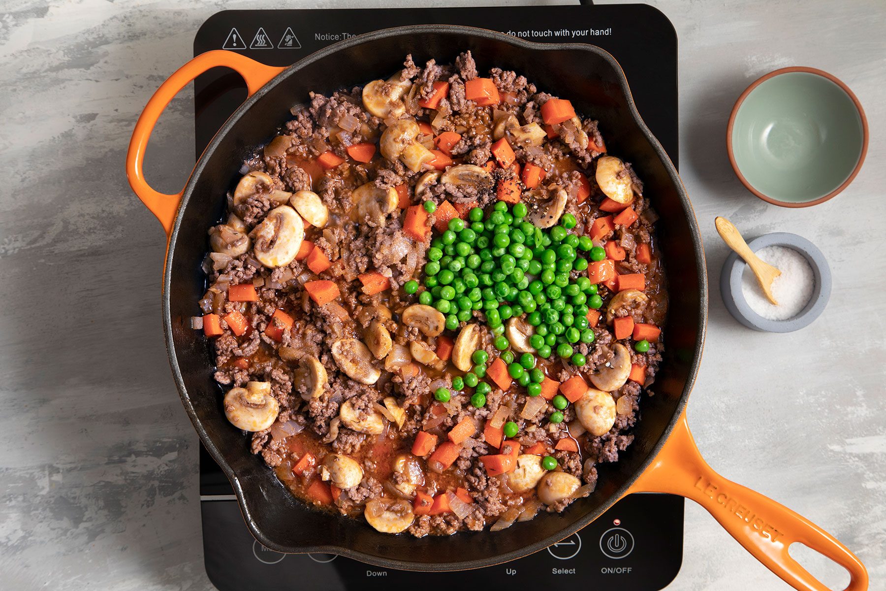 Peas added to meat mixture 