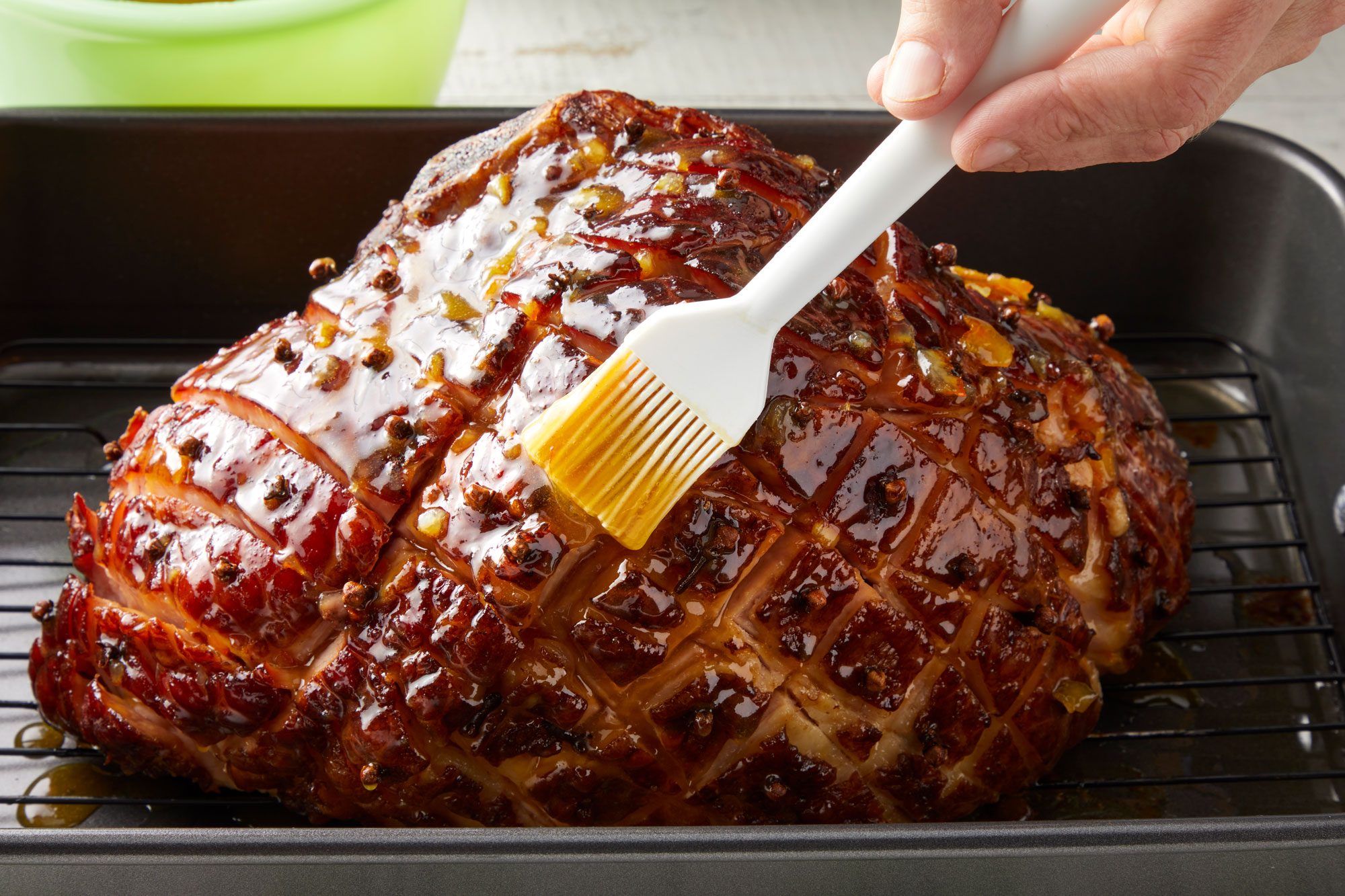 Glaze the ham with brush