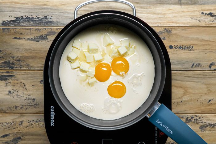 Eggs butter milk is cooked in a sauce pan