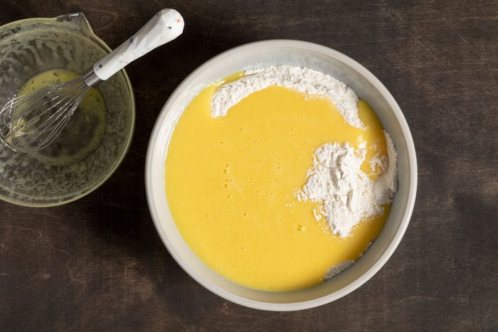 Mix eggs, oil, orange juice and vanilla together