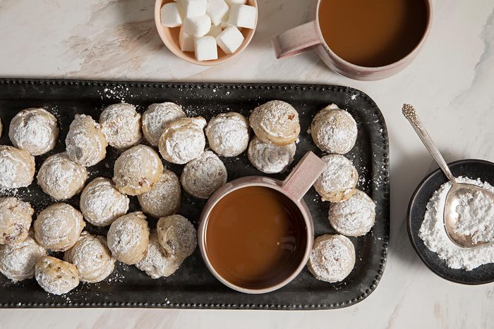 Pecan Sandies served on platter with chocolate dip