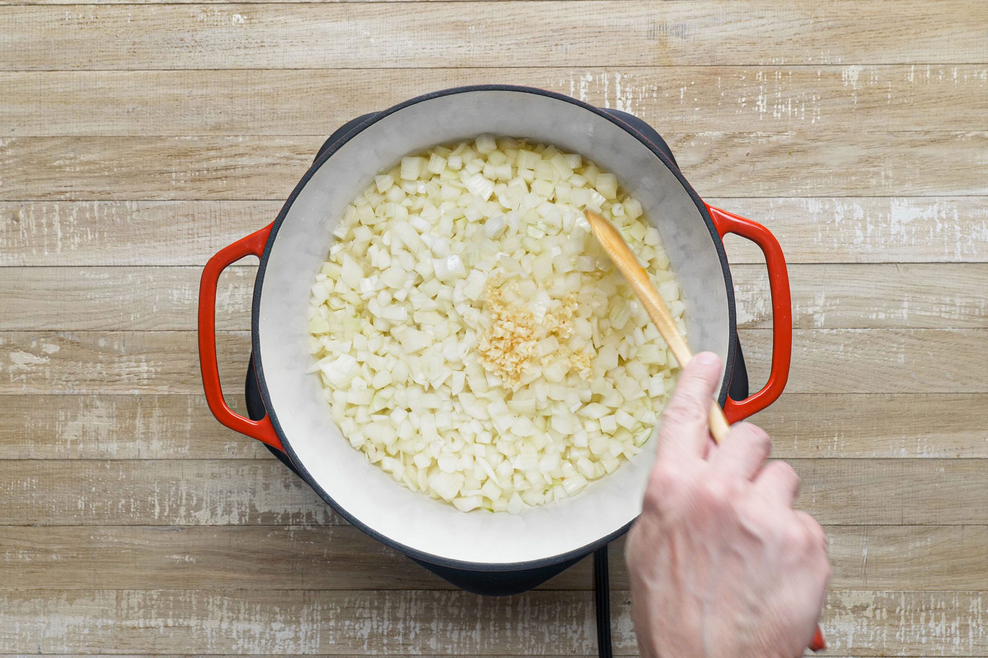 Saute onions and garlic in 1 tablespoon of olive oil in dutch oven