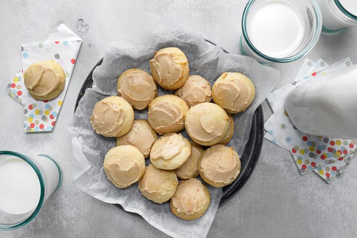 Sour Cream Drops served in a bowl with milk on the side