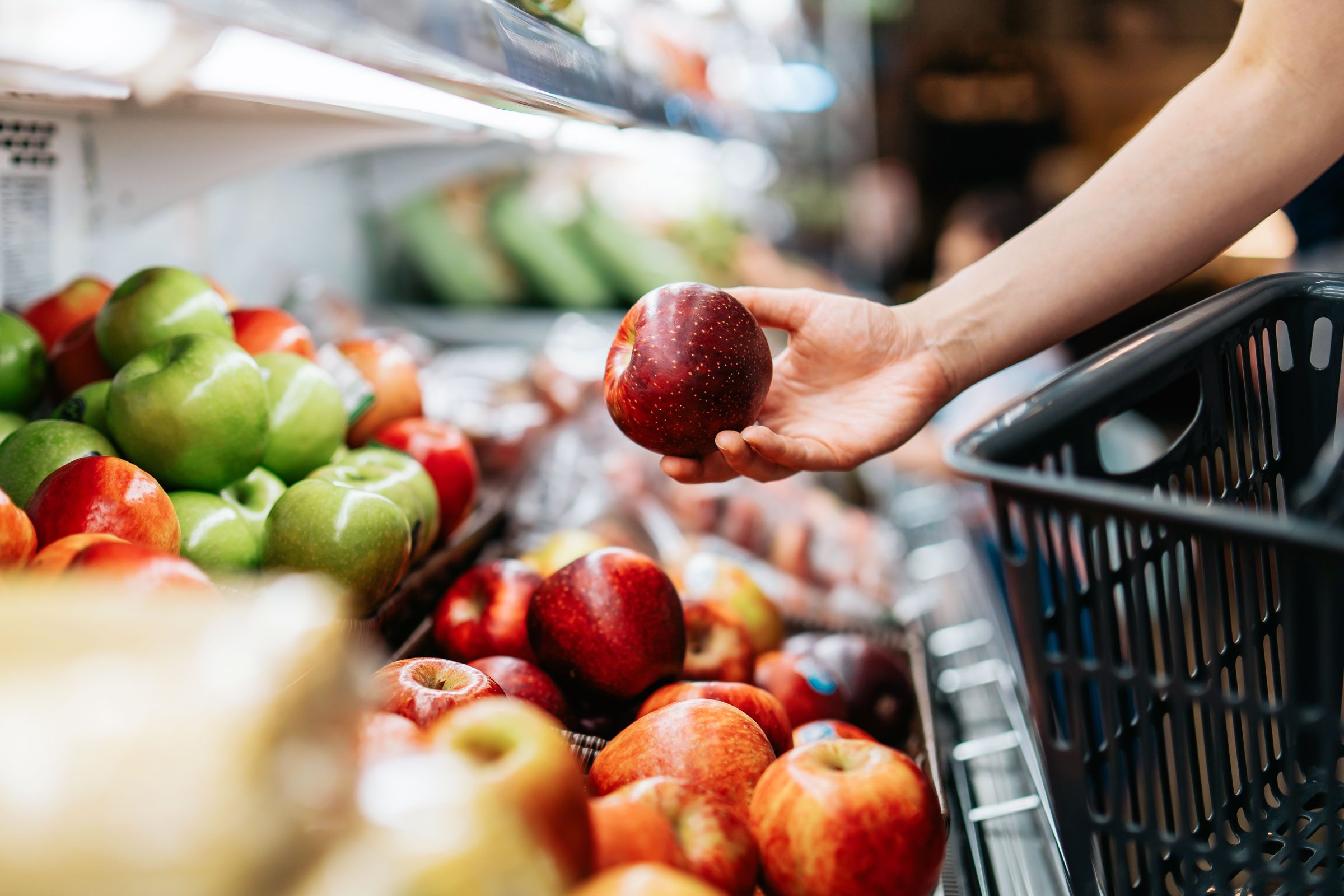 picking apples from store