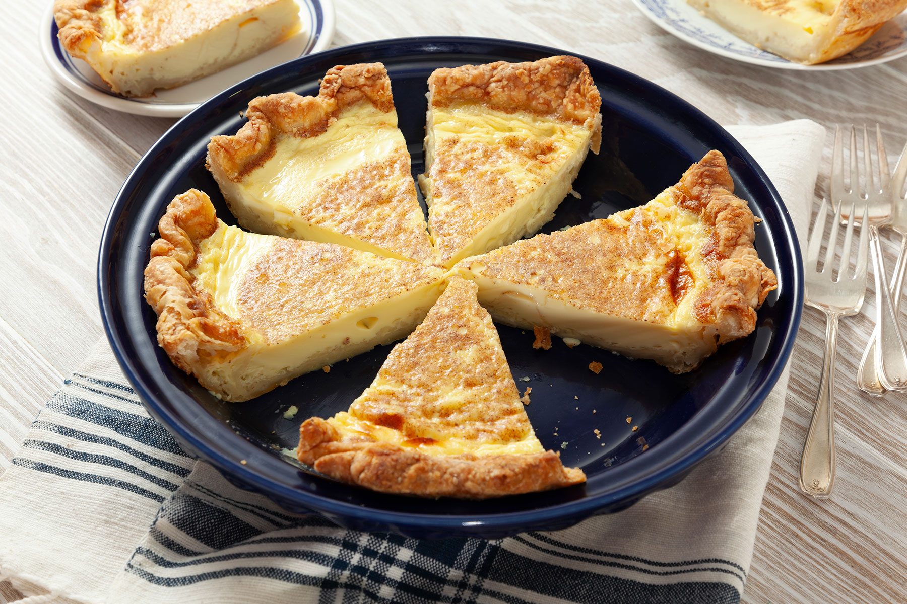 Custard Pie on black plate