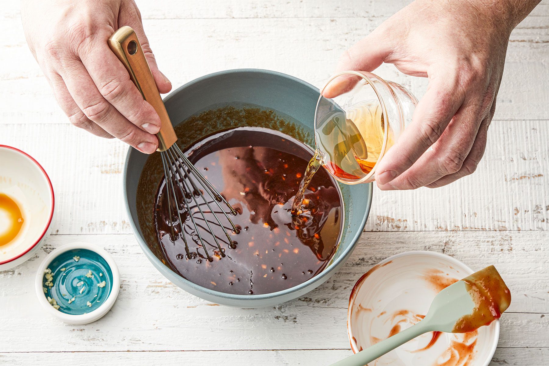 Top view shot of mix the first 6 ingredients in a small box; white wooden background;