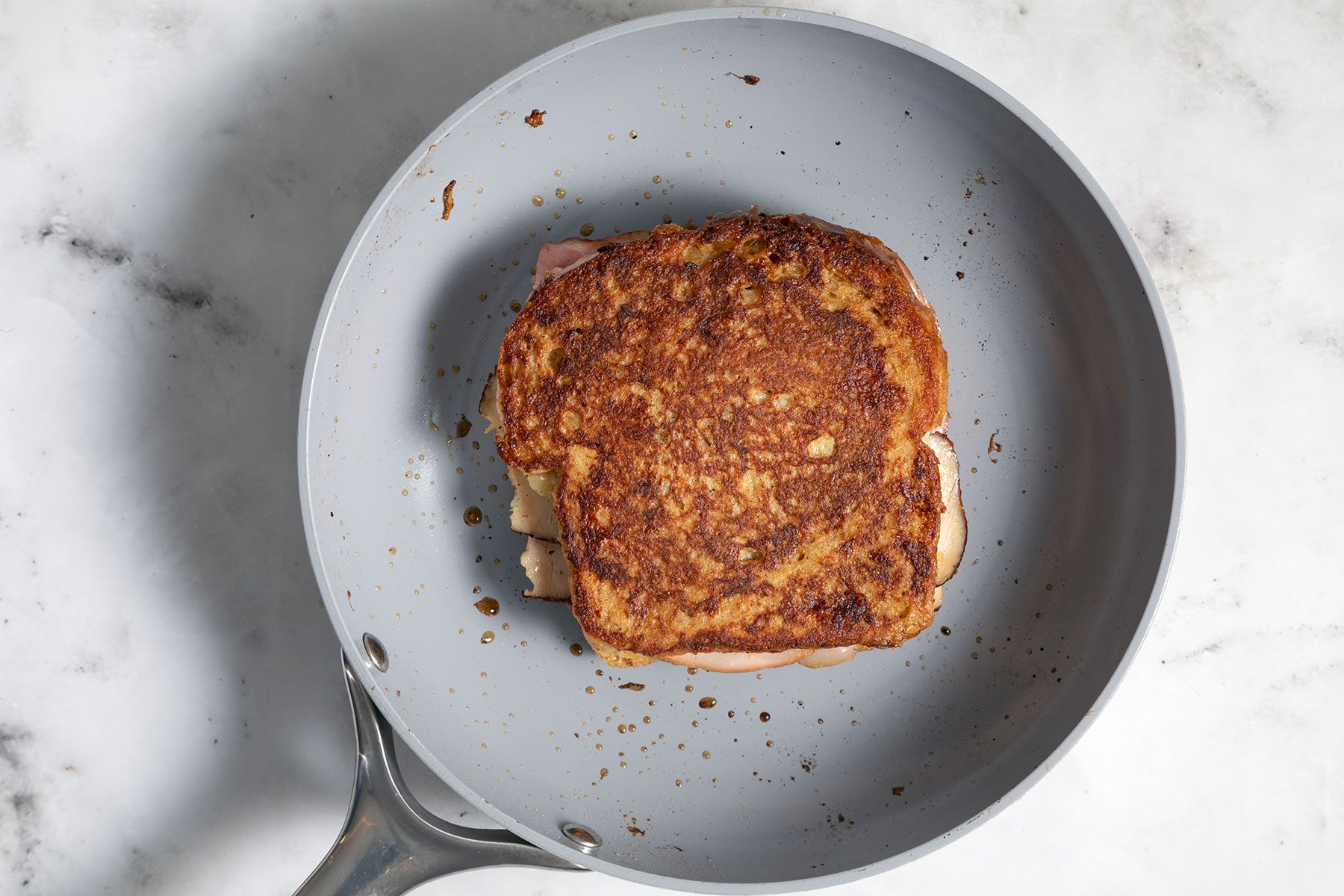 Toasting sandwich on skillet
