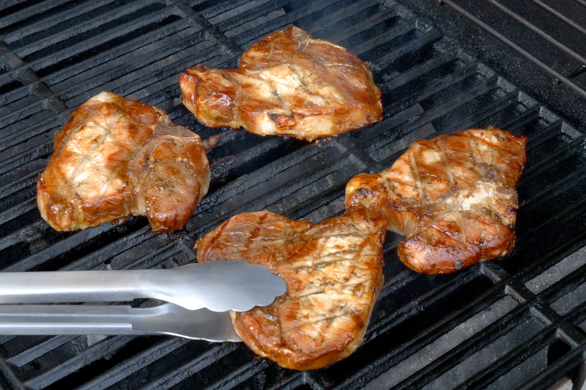 Grilling chops on greased grill rack on each side or until meat reaches desired doneness