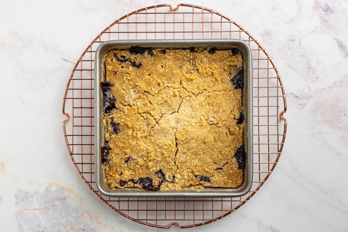 Taste of Home blueberry crisp recipe photo of recipe finished, out of the oven and on a cooling rack.