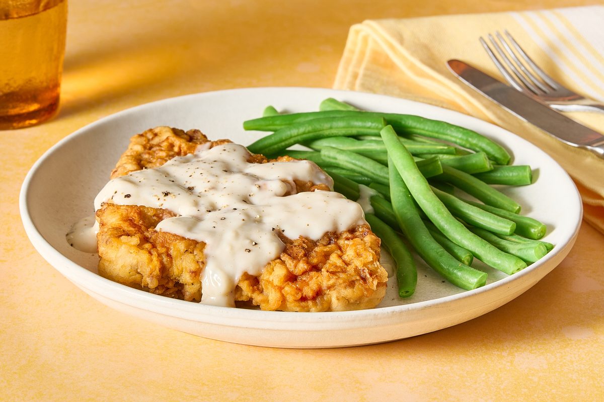 Closeup shot of chicken fried steak and gravy 