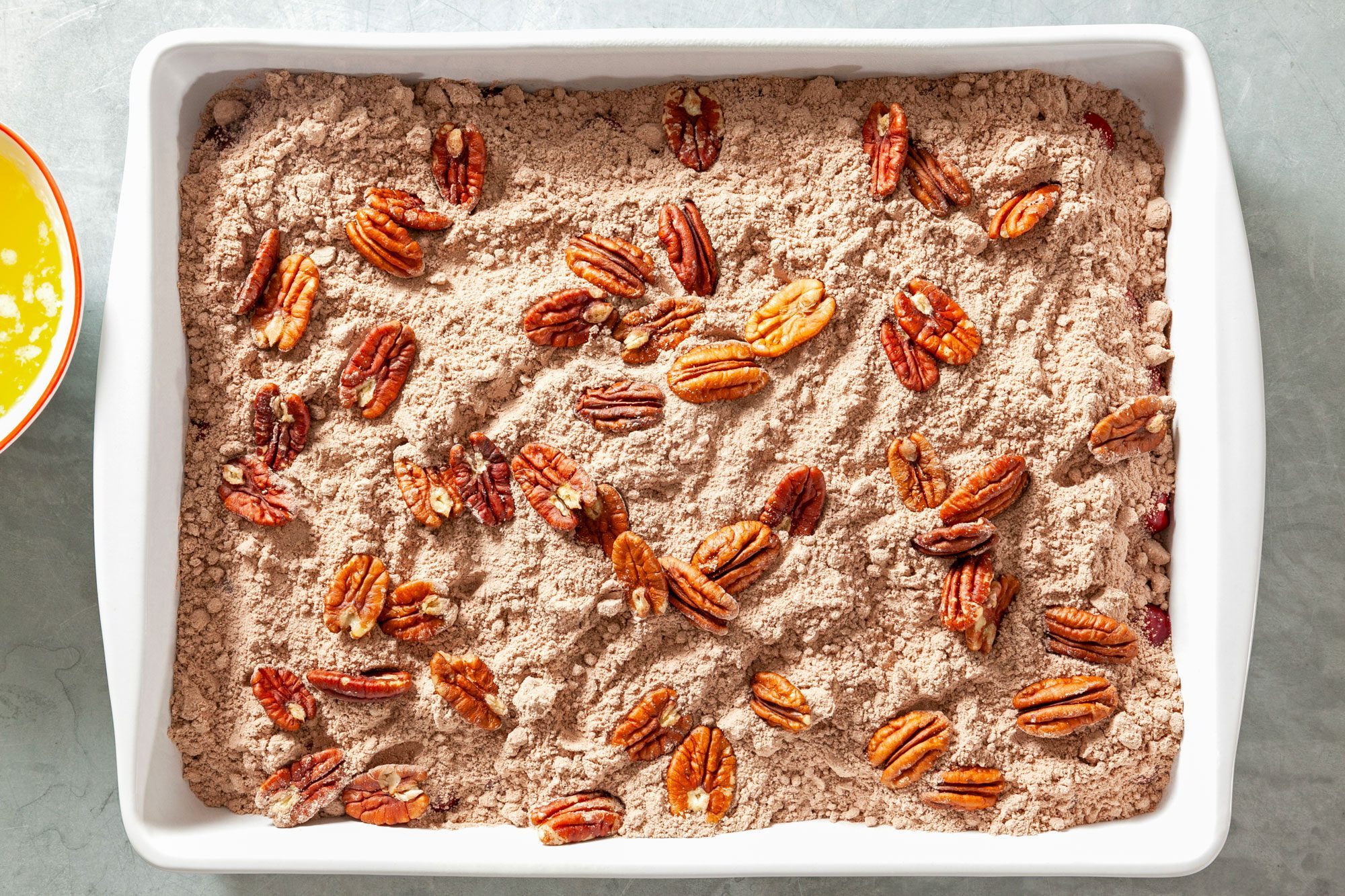 Overhead shot of cake mix Sprinkled with pecans