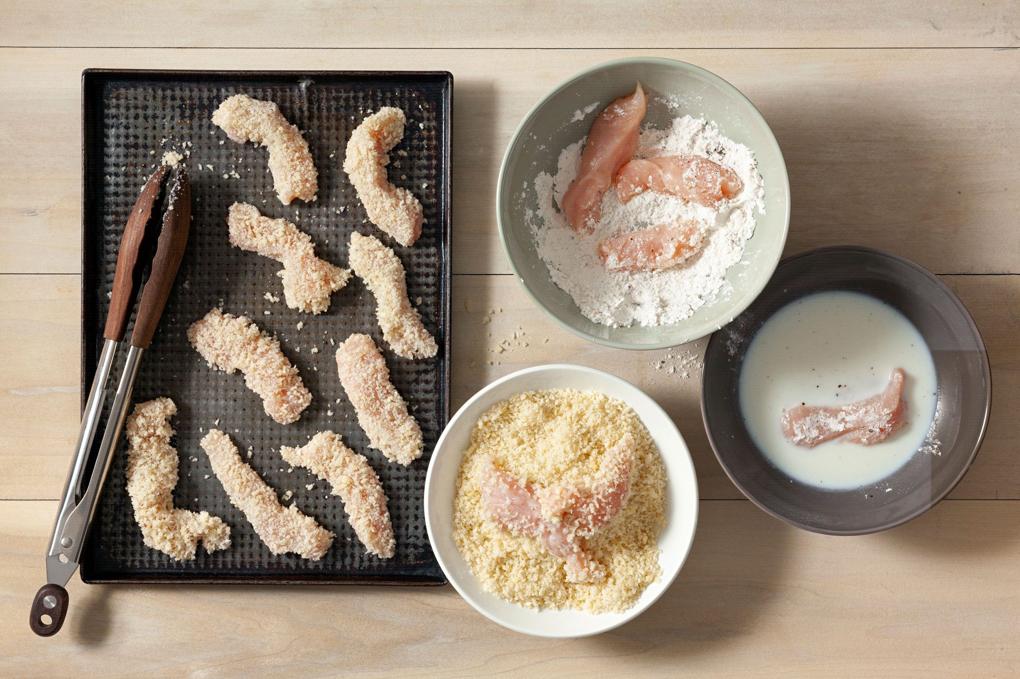 Dredge both sides of chicken through the flour