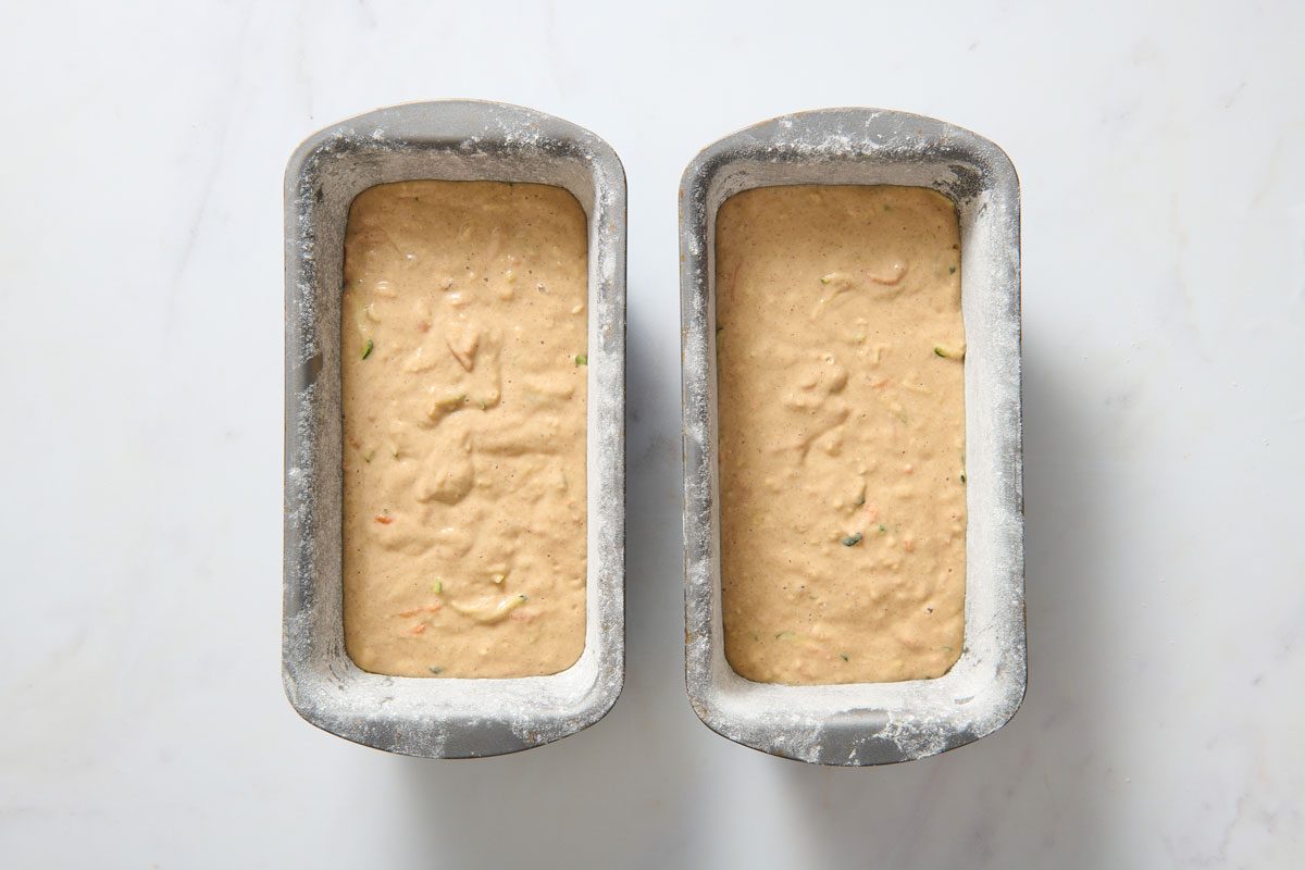 Zucchini Carrot Bread Batter Poured Into The Bread Molds