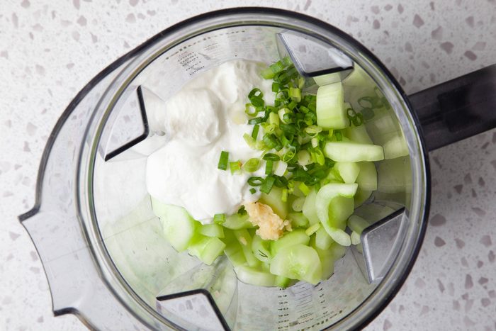 Step 2 of Taste of Home Cucumber Soup is adding the rest of the ingredients to a food processor or blender, the stirring in dill