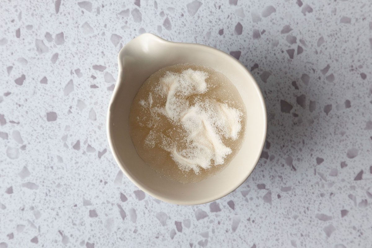 Step 2 of Taste of Home Mango Cheesecake is to dissolve the gelatin in water