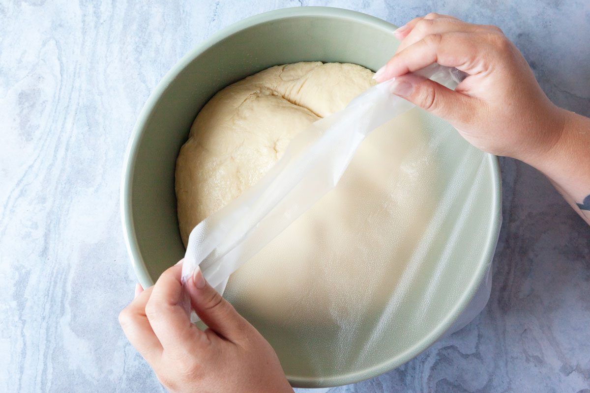Step 3 of Taste of Home Amish Cinnamon Rolls is to turn the dough out onto a floured work surface and knead it until it’s smooth and elastic. Transfer it to a greased bowl and turn it once to grease the top of the dough. Cover the dough and refrigerate it overnight.