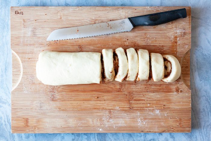 Step 5 of Taste of Home Amish Cinnamon Rolls is to roll up each rectangle jelly-roll style starting with a long side and pinching the seams to seal them. Cut each log into 12 equal slices