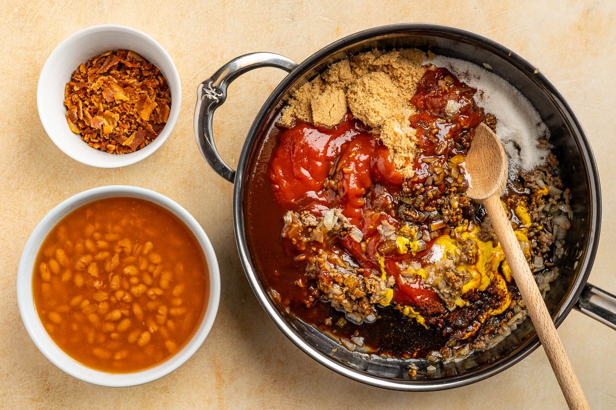 Taste of Home BBQ baked beans recipe photo of the rest of the ingredients added to the skillet.